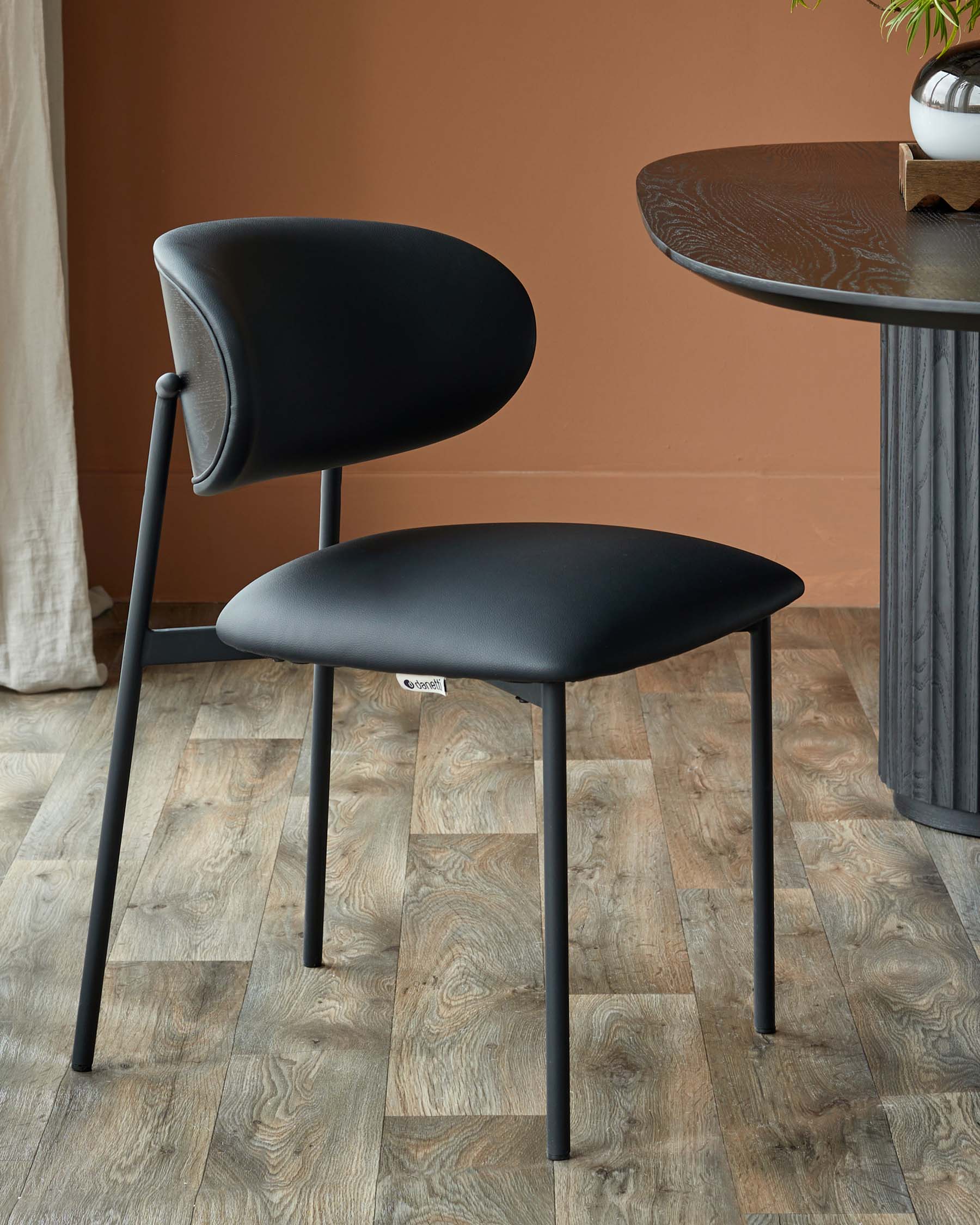 Cree black faux leather dining chair