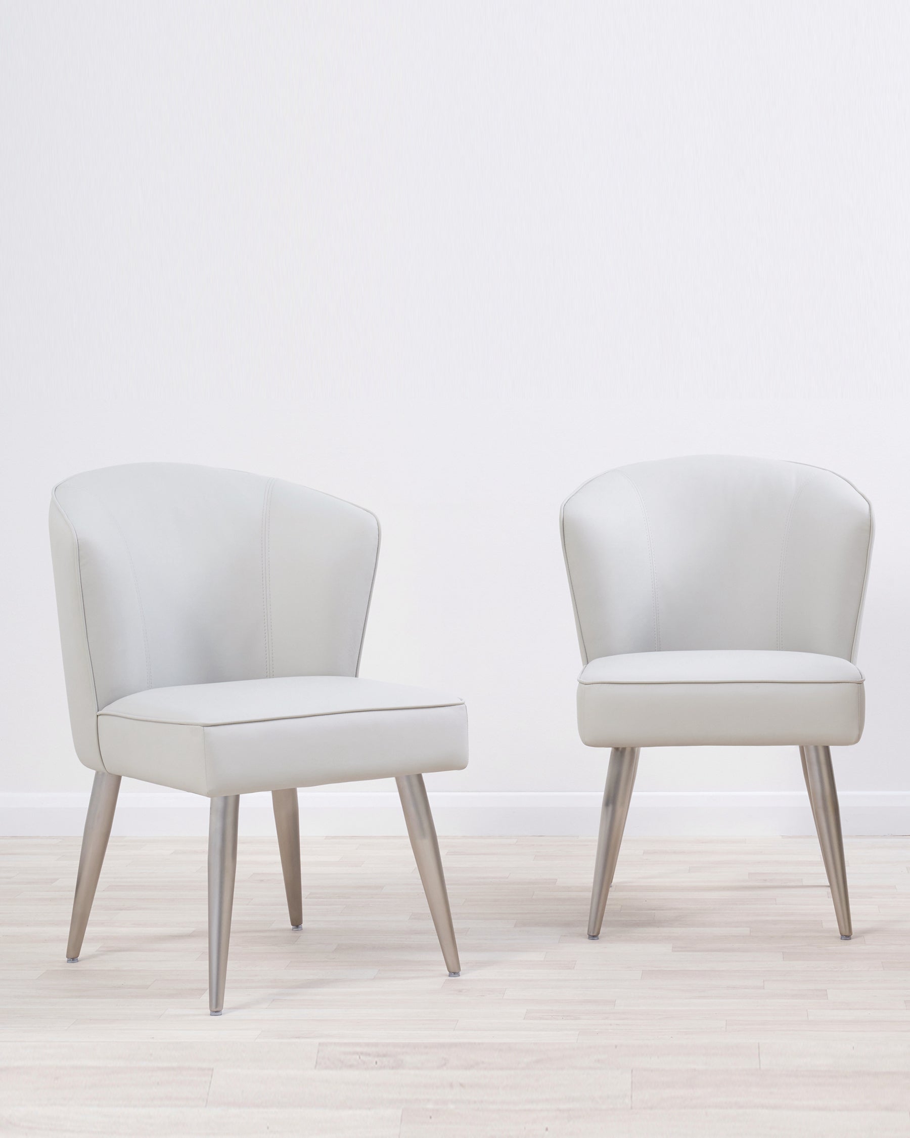 Mellow Light Grey Faux Leather Dining Chair With Steel Legs