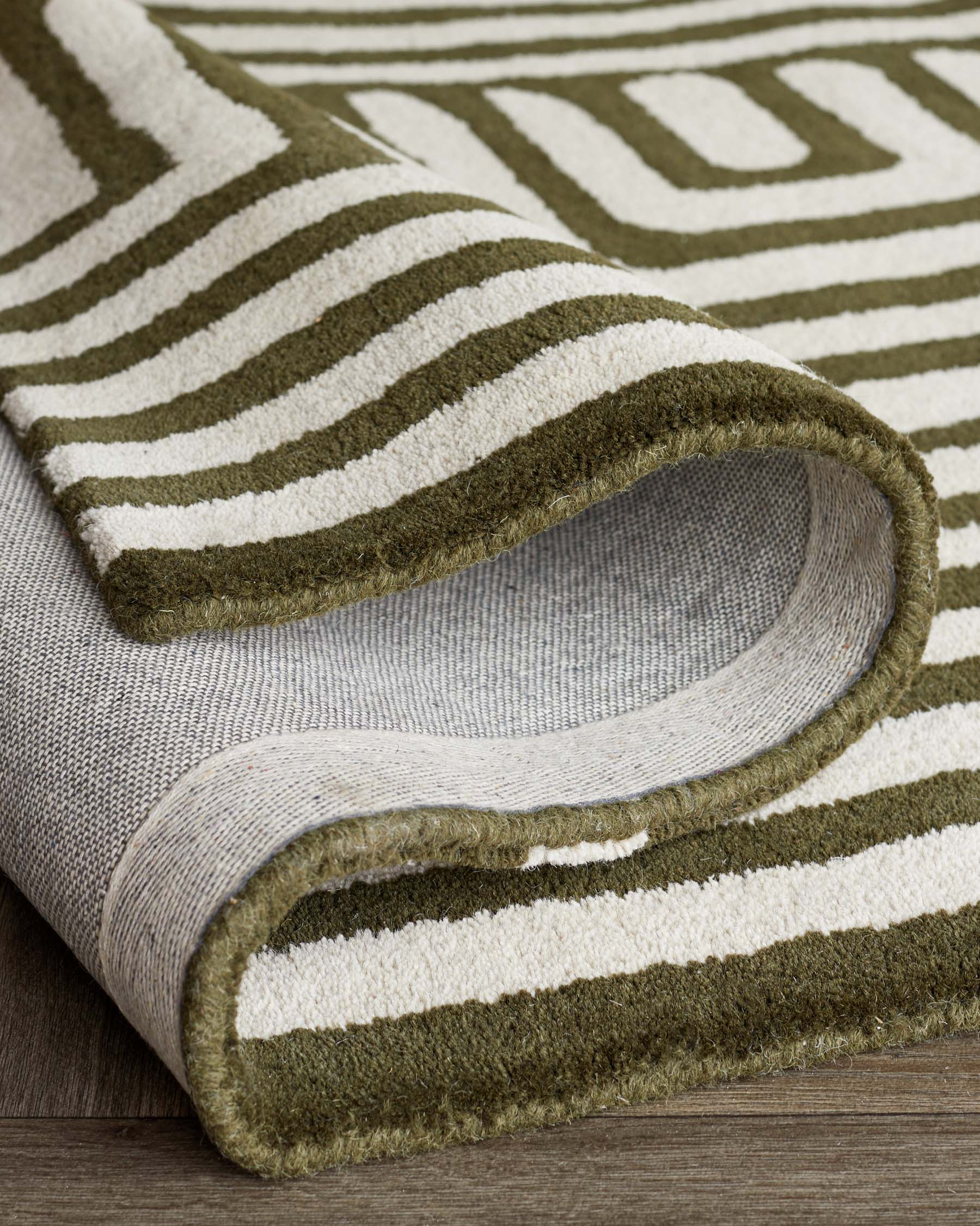 Abstract Swirl dark green wool small rug