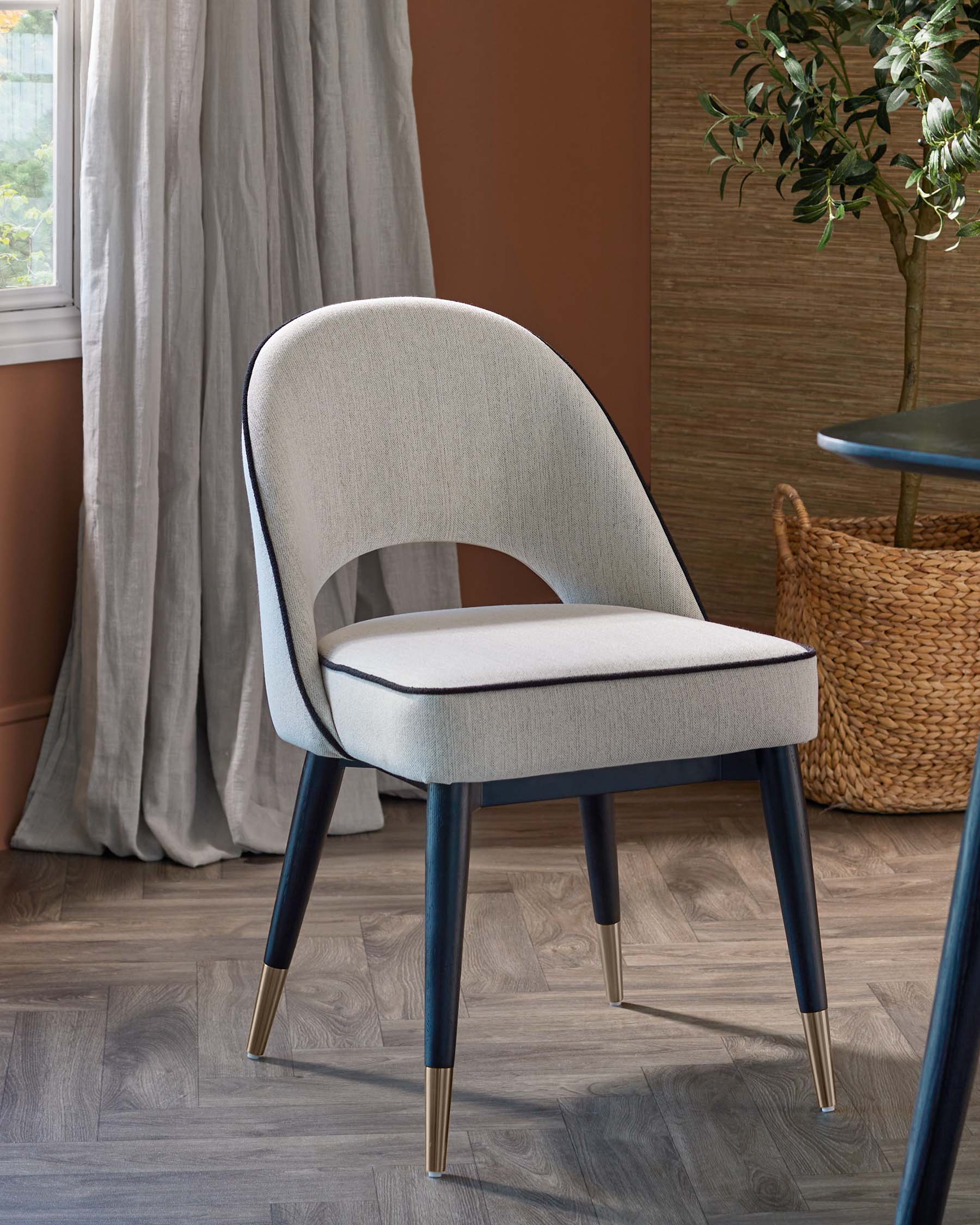 Clover ivory dual tone fabric dining chair with bronze legs